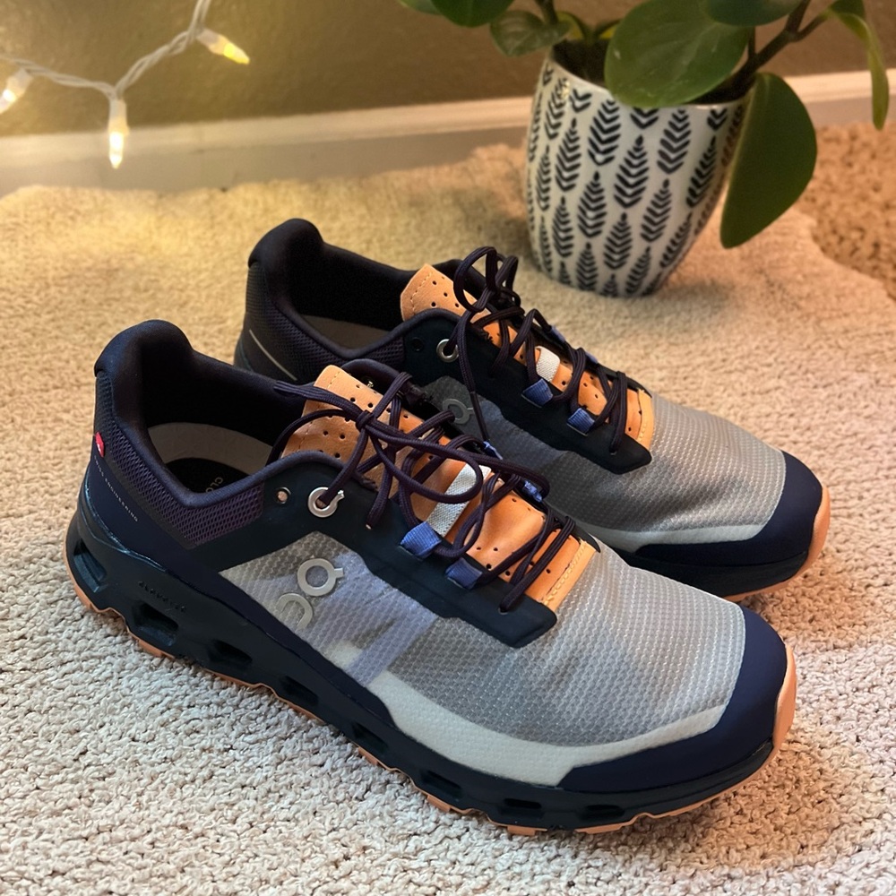 On Running Blue and Tan Athletic Shoes